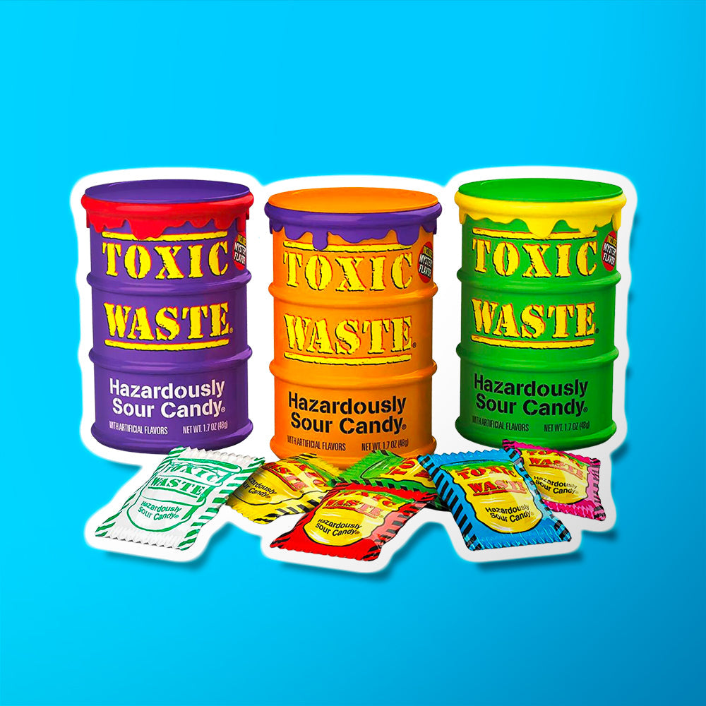 3 barils de couleurs différentes ; mauve, orange et vert et devant il y a les petits emballages individuels colorés. Le tout sur fond bleu