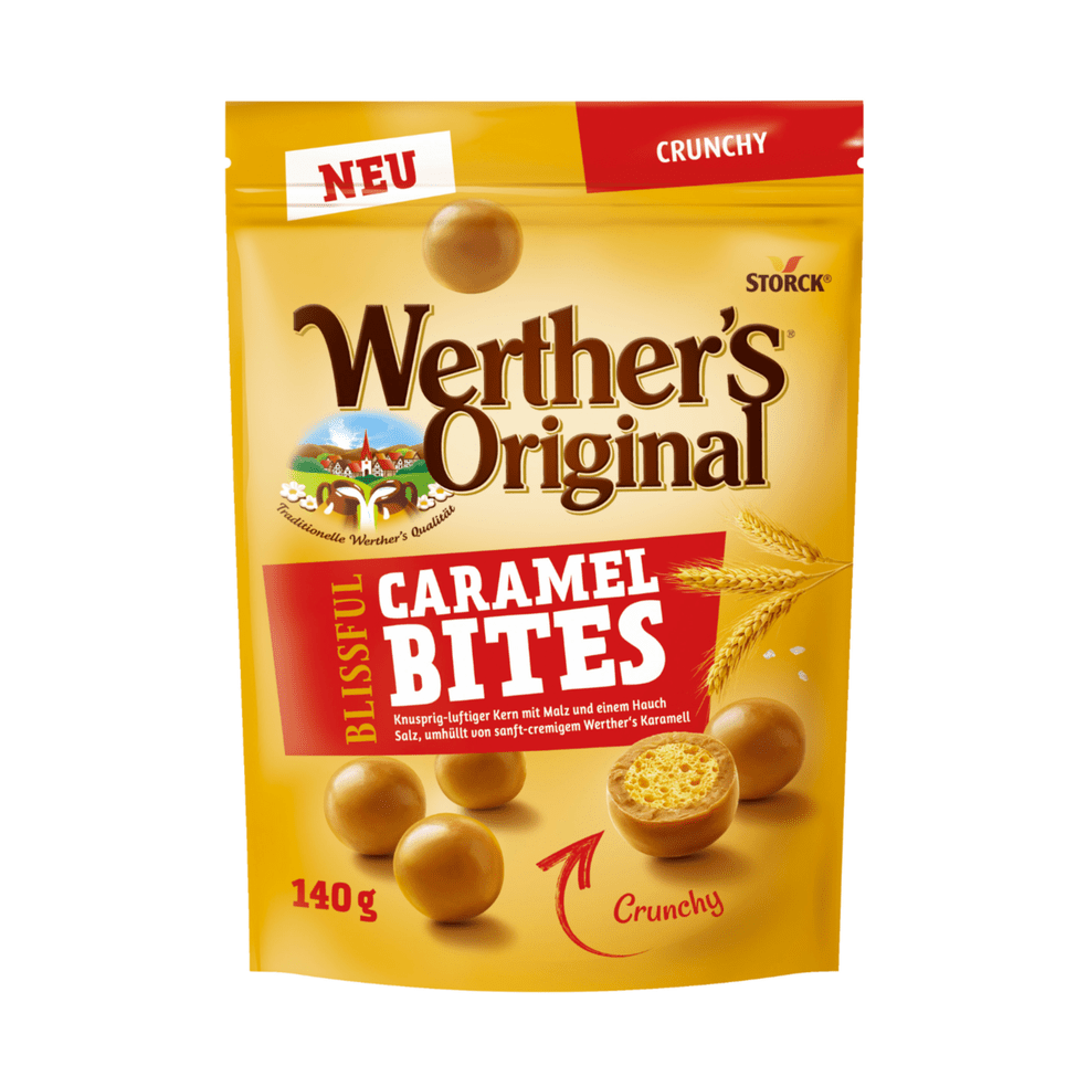 Un emballage brun avec des petites boules brunes, 3 épies de blé et un encadré rouge avec écrit « Caramel Bites », le tout sur fond blanc