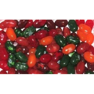 Un tas de bonbons en forme d’haricots rouge, orange et vert